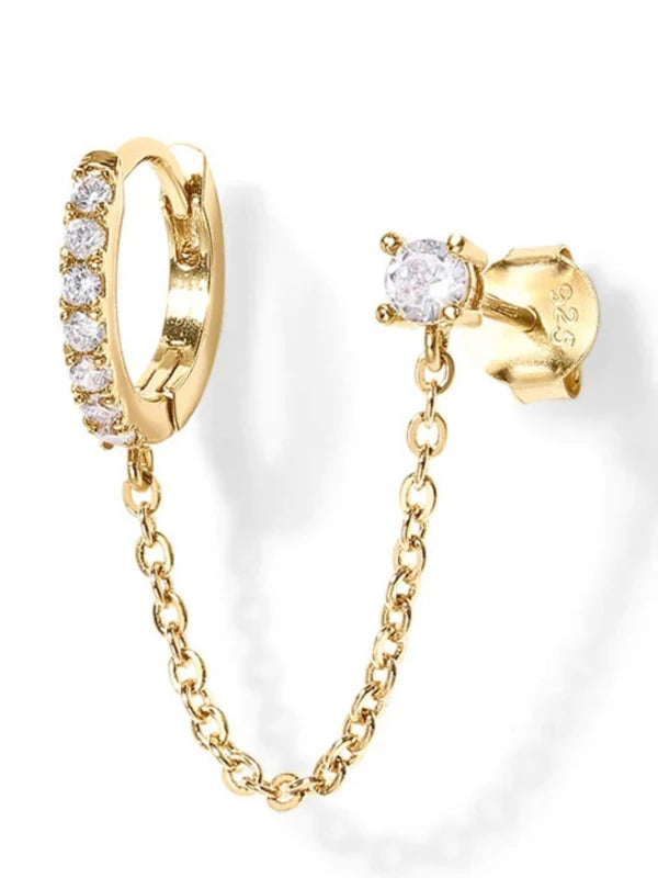 Gold hoop earring with chain and matching stud earring on a white background
