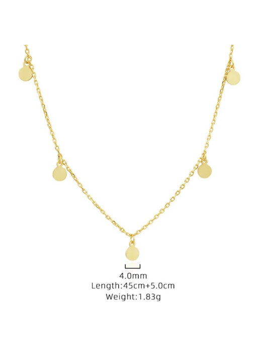 Gold necklace with small round pendants on a white background