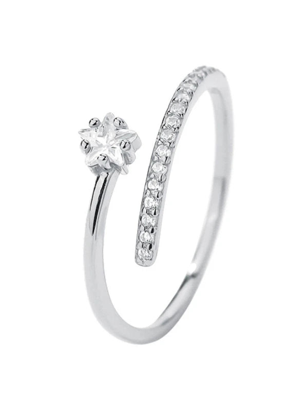 Silver ring with a diamond on a white background