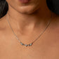 Necklace with heart-shaped pendants on a woman's neck