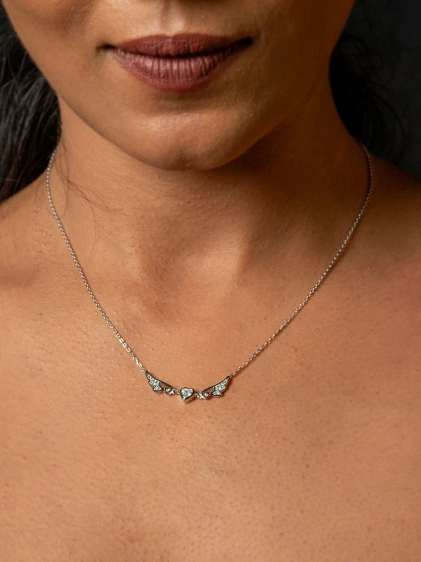 Necklace with heart-shaped pendants on a woman's neck