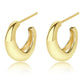 Gold hoop earrings on a white background