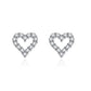 Heart-shaped earrings with clear stones on a white background