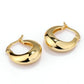 Gold hoop earrings on a white background