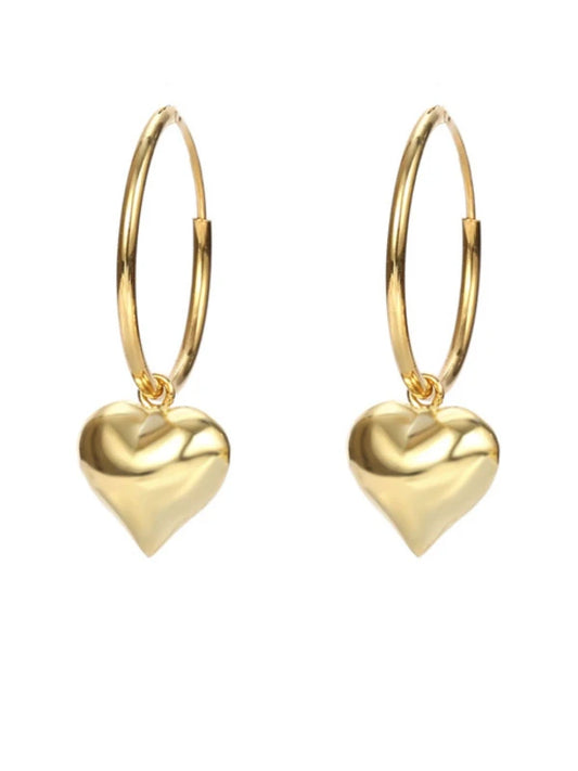 Gold heart-shaped hoop earrings on a white background