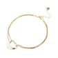 Gold heart-shaped pendant necklace on a white background