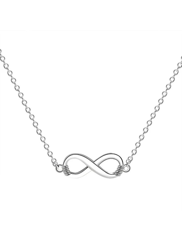 Silver infinity necklace on a white background