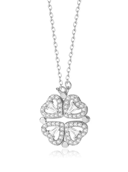 Silver four-leaf clover pendant necklace on a white background