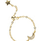 Gold bracelet with star and moon charm on a white background