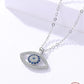 Silver necklace with an eye-shaped pendant on a white background
