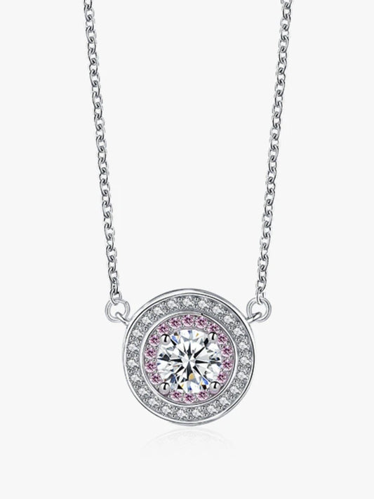 Diamond necklace with pink gemstones on a white background