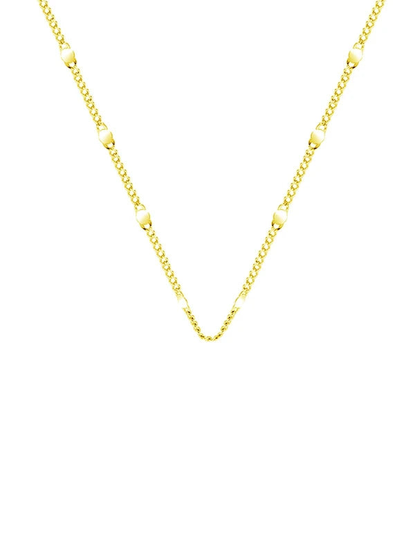 Gold chain necklace on a white background