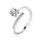 Silver ring with a diamond on a white background