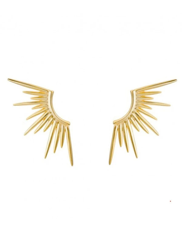 Gold wing-shaped earrings on a white background