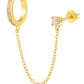 Gold hoop earring with chain and matching stud earring on a white background