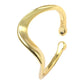 Gold open cuff bracelet on a white background